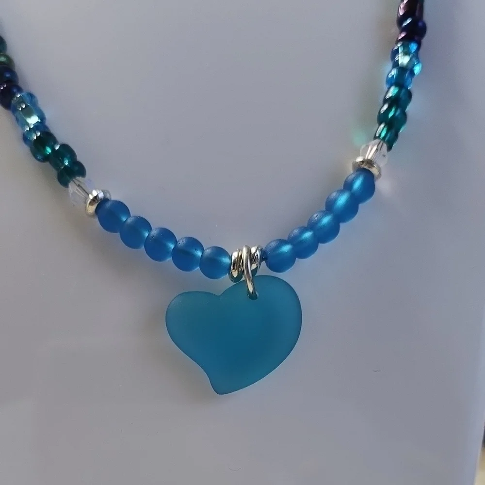 Turquoise Blue Heart Pendant Necklace with Silver Accents!
